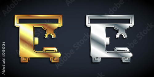 Gold and silver Coffee machine icon isolated on black background. Long shadow style. Vector