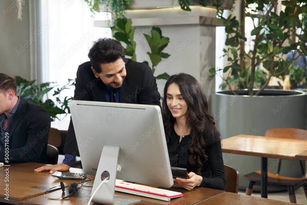 business support on telephone in office. young business people chatting in start up office business support on telephone in office. young business people chatting in start up office