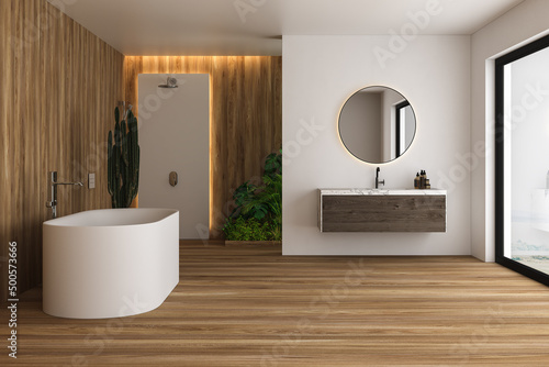 Interior of modern bathroom with white and wooden walls  floor and plants  comfortable white bathtub with faucet  shower  round mirror hanging on wall with stone countertop. 3d rendering 