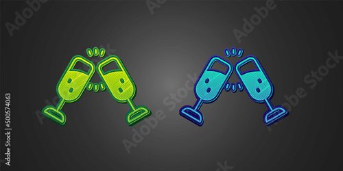 Green and blue Glass of champagne icon isolated on black background. Merry Christmas and Happy New Year. Vector