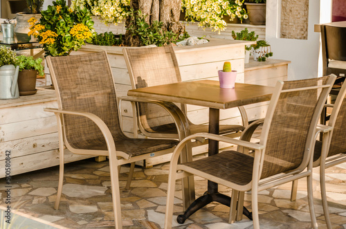 Chairs in the garden restaurant in Leptokarya  Greece.