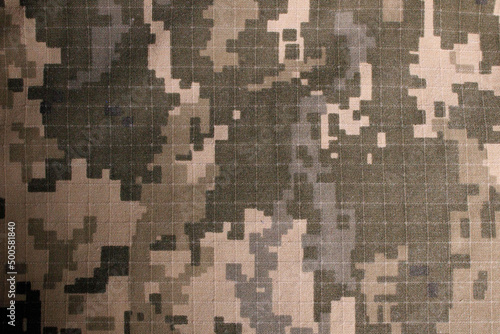 Ukrainian military uniform fabric. Pixel military uniform. Military camouflage fabric background