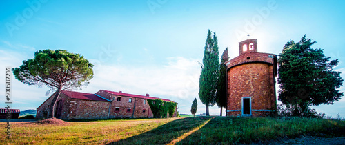 Obraz na płótnie Tuscany, Italy, May, 2017: Magic landscape with chapel of Madonna di Vitaleta on a sunny day in San Quirico d'Orcia (Val d'Orcia) in Tuscany, Italy. Excellent tourist places. w salonie