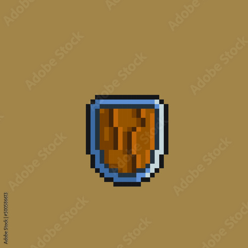 wooden shield in pixel art style