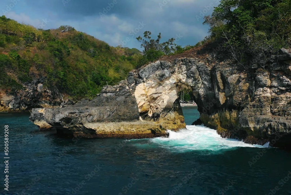 The breathtaking nature of Bali.Sea rest palm trees water travel tropics ocean rocks hills wildlife.