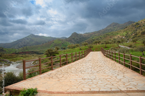 View of a very beautiful valley whit a nice bridge in Andalusia near Almogia, Spain photo