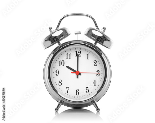 Alarm clock isolated on white background. Ten hours after midnight or noon. Twenty-two hours on the clock.