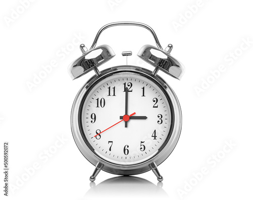 Alarm clock isolated on white background. Three hours after midnight or noon. Fifteen hours on the clock.