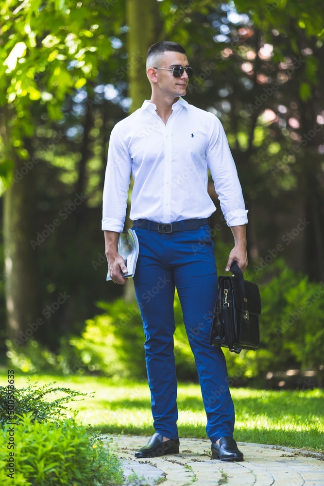 Portrait of happy mature man on outdoor background