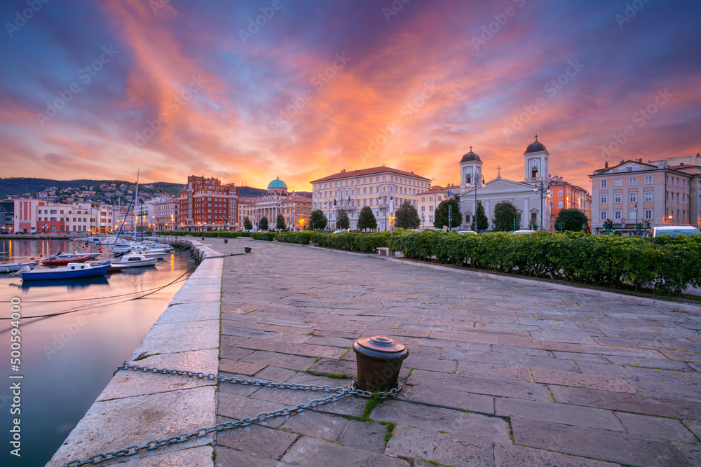 Trieste, Italy. Cityscape image of downtown Trieste, Italy at dramatic sunrise.