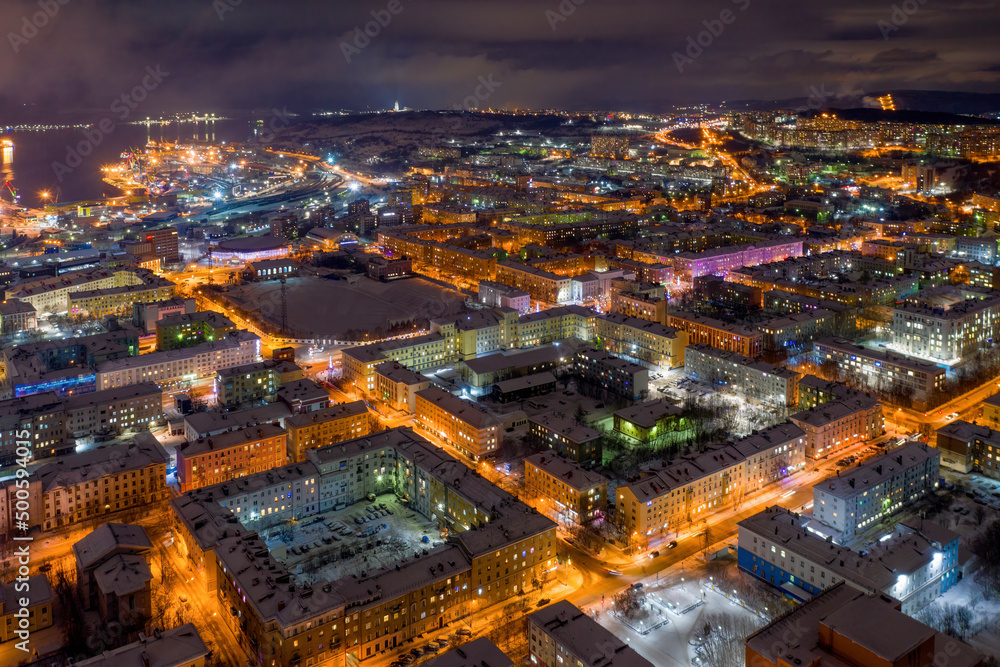 Aerial view of the town and central stadium on polar night. Murmansk, Russia. Aerial view of the town and central stadium on polar night. Murmansk, Russia.