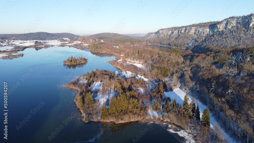 Aerial view of a lake and mountains