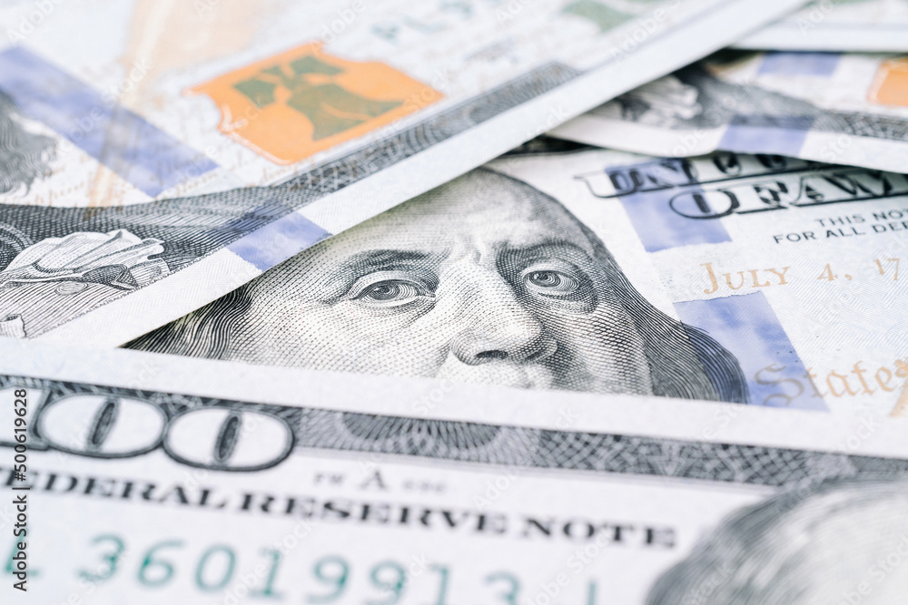 Us dollar. American money, falling cash. Hundred dollars isolated on white background. Us dollar. American money, falling cash. Hundred dollars isolated on white background.