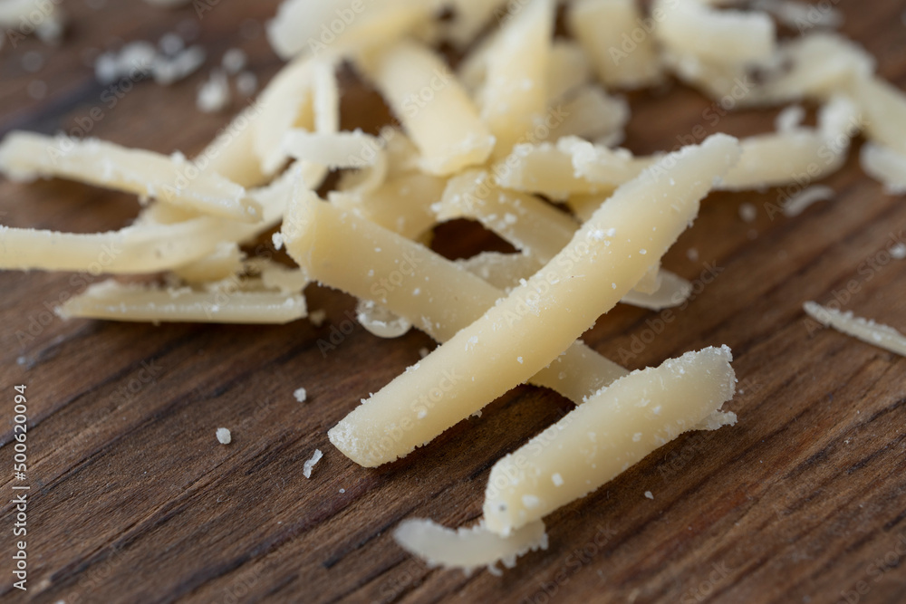 Heap of grated parmesan, healthy food, dairy product Heap of grated parmesan, healthy food, dairy product