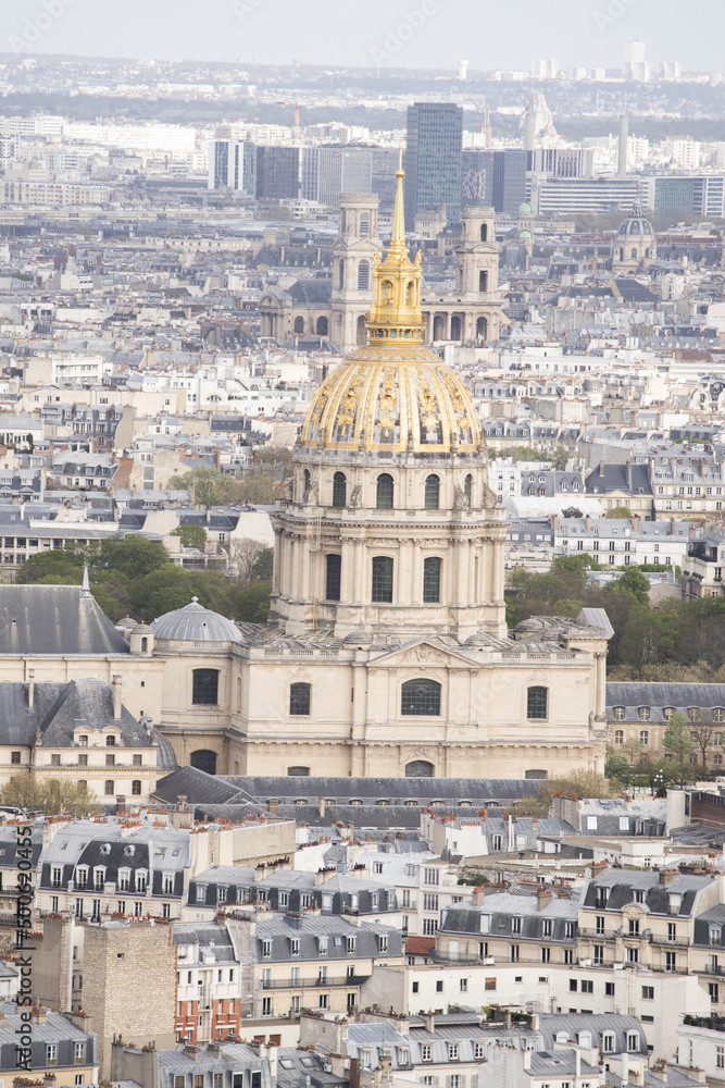 Paris, France, Europe: aerial view of the skyline of the city with the Saint Louis cathedral in the Les Invalides complex and the Pantheon seen from the top of the Eiffel Tower 
