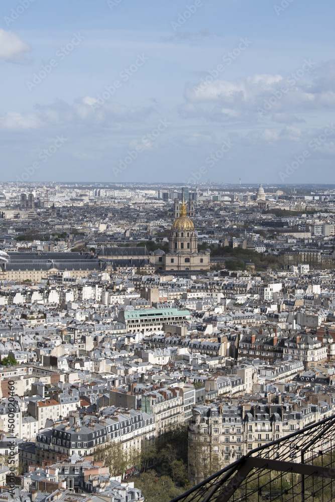 Paris, France, Europe: aerial view of the skyline of the city with the Saint Louis cathedral in the Les Invalides complex and the Pantheon seen from the top of the Eiffel Tower 