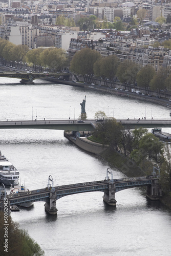Paris, France: Europe: view of the replica of the Statue of Liberty made by Frederic Auguste Bartholdi in 1889 at the end of the Ile aux Cygnes (Swan Island) on the river Seine photo