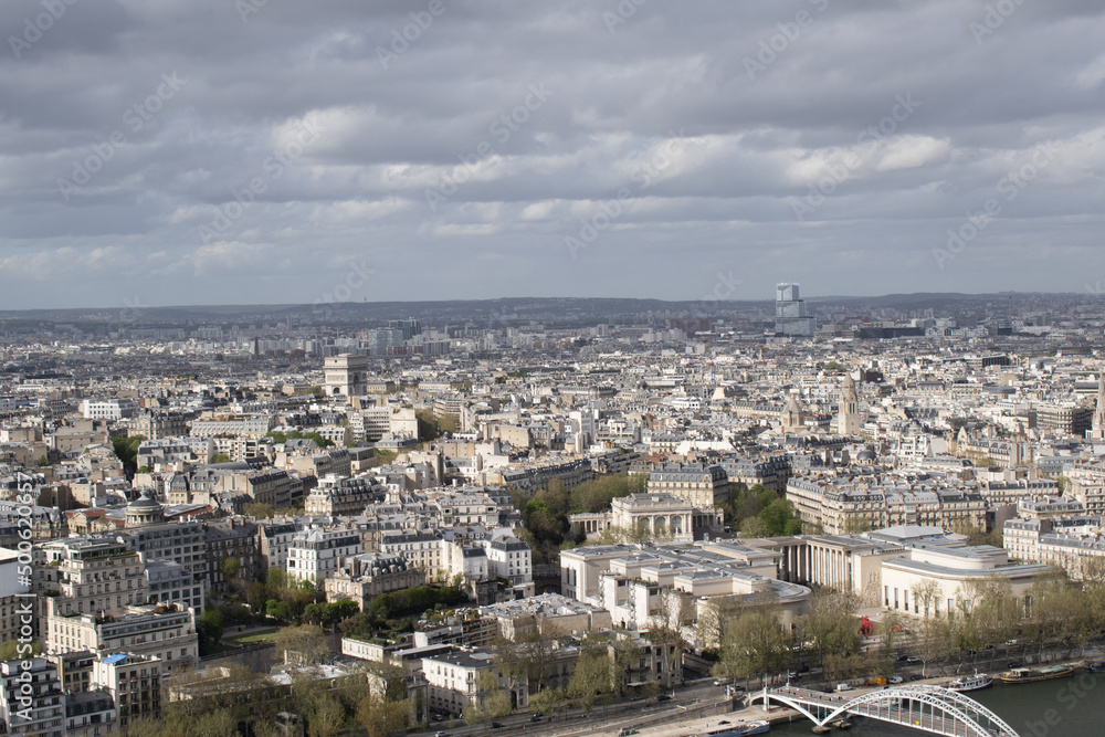Paris, France, Europe: aerial view from the top of the Eiffel Tower with river Seine, Triumphal Arch of the Star (Arc de Triomphe de l'Etoile) and pedestrian and cycle bridge Passerelle Debilly
