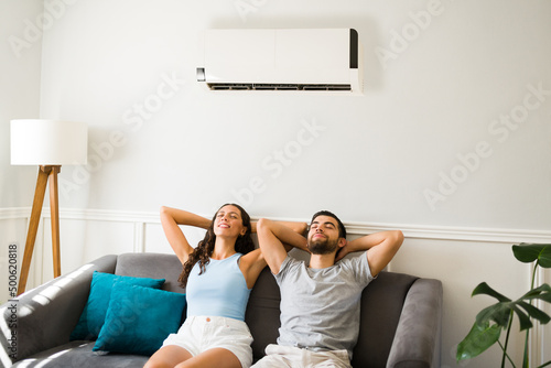 Relaxed couple feeling cool during a heat wave photo