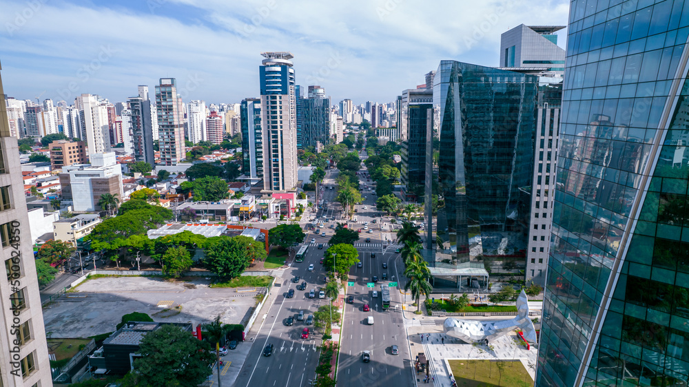 Aerial view of Avenida Brigadeiro Faria Lima, Itaim Bibi. Iconic commercial buildings in the background. With mirrored glass