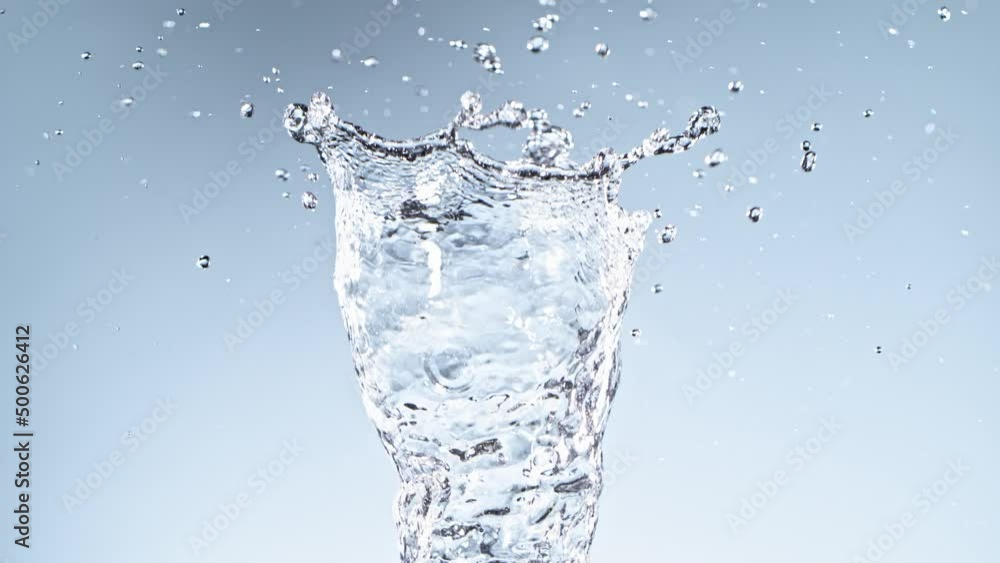 Super Slow Motion Shot of Water Vortex on Light Blue Background at 1000fps. Super Slow Motion Shot of Water Vortex on Light Blue Background at 1000fps.