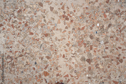 Red stones with concrete paviment photo