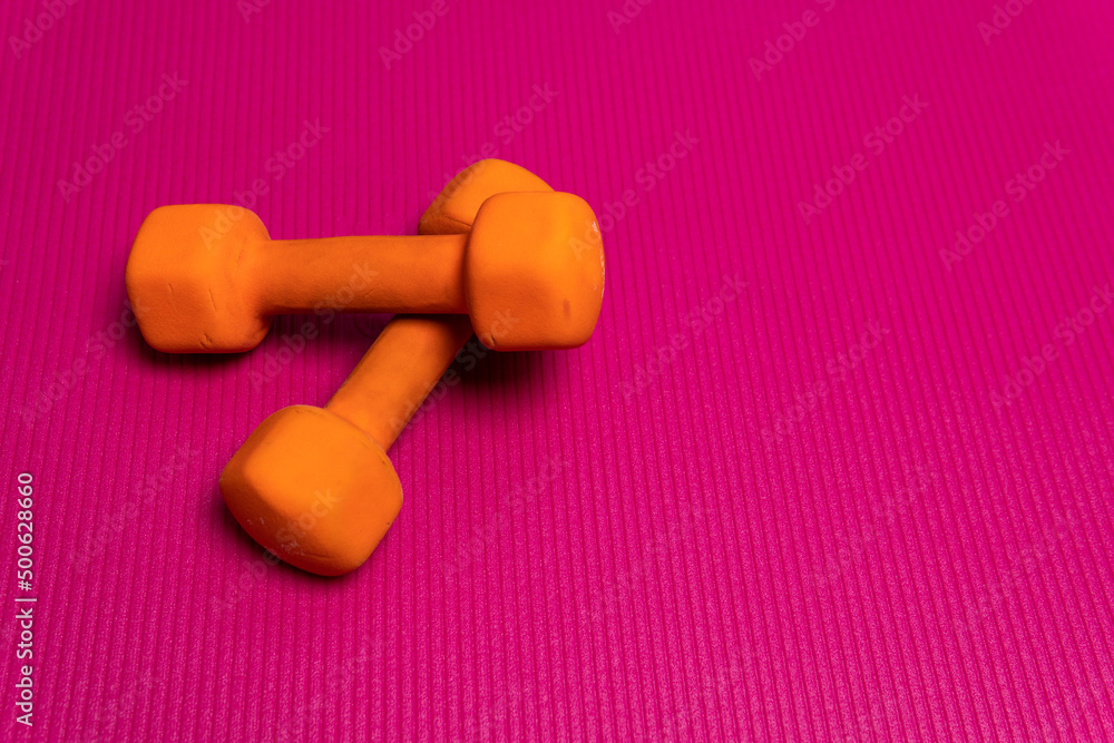 Mat orange space dumbbell fitness gym background concept pink, from wellness fit in exercise from closeup banner, girl isolated. Top activity, Mat orange space dumbbell fitness gym background concept pink, from wellness fit in exercise from closeup banner, girl isolated. Top activity,