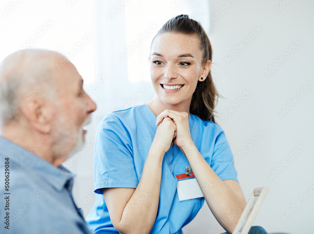 Fototapeta premium nurse doctor senior care caregiver help assistence retirement home nursing elderly man