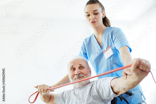 nurse doctor senior care exercise physical therapy ecercising help assistence retirement home  elderly man