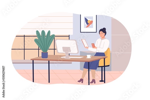 The girl works at a computer from home at a table near the window. The daily routine and daily activities