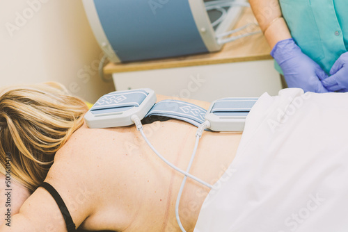 Fotografie Treating a patient with ultrasonic magnetotherapy