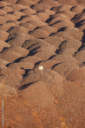 Waste rock dumps are stockpiled after iron ore has been extracted from them