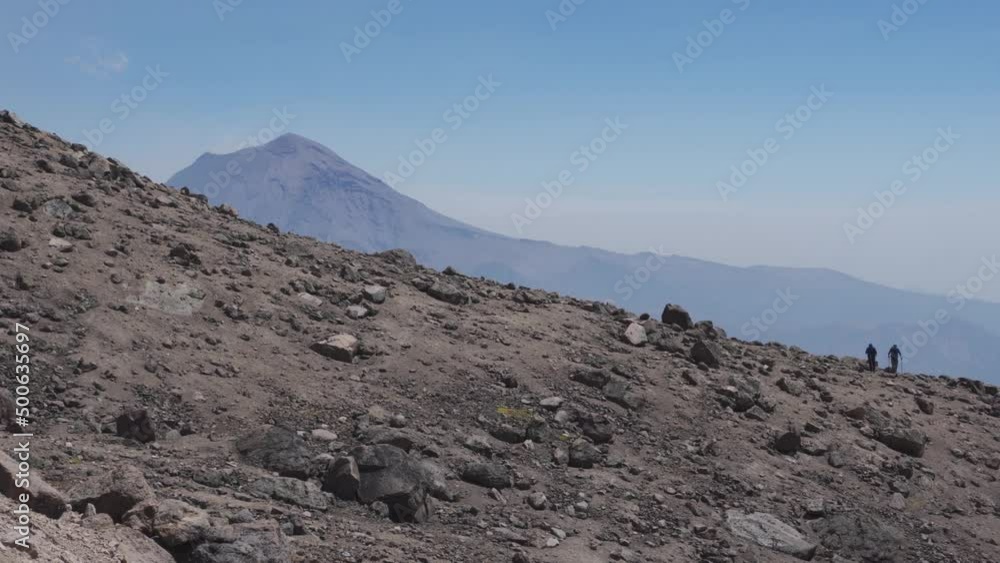 Man hiking up mountain in mexico Man hiking up mountain in mexico