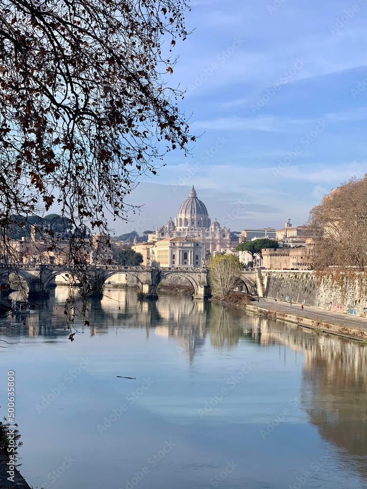 Beautiful views of the Vatican City on the banks of the Tiber River on a sunny morning