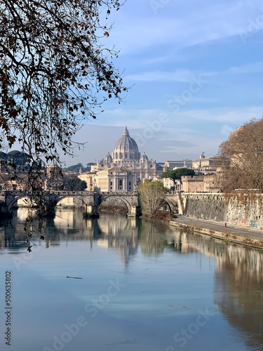 Beautiful views of the Vatican City on the banks of the Tiber River on a sunny morning photo
