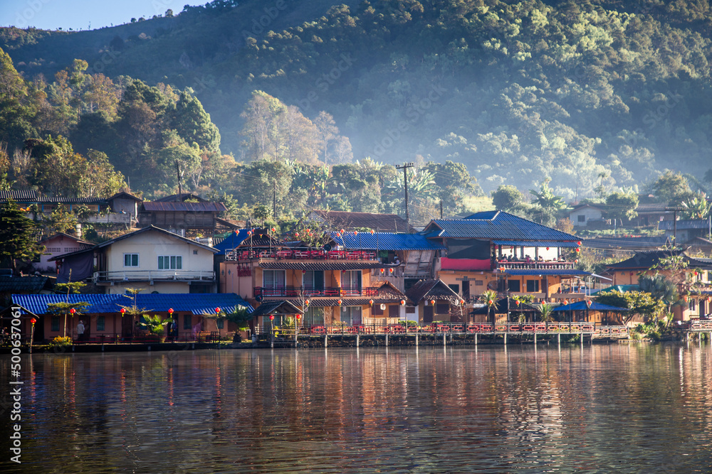 Sunrise with fog over Ban Rak thai, chinese village near a lake in Mae Hong Son, Thailand