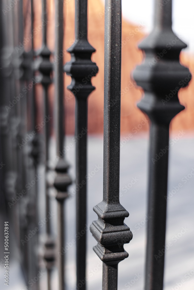Modern metal railings and handrails in the loft style. The metal is