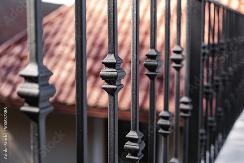 Modern metal railings and handrails in the loft style. The metal is treated with a primer and anti-corrosion paint. Interior design in industrial style.