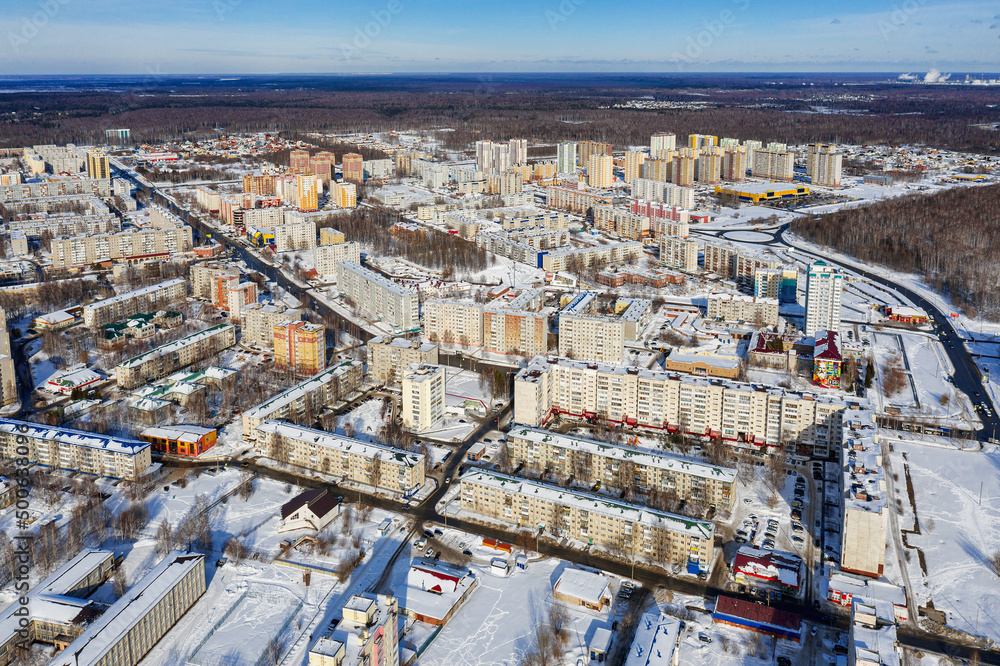 Tobolsk city in winter. Residential area, city development. Aerial view.