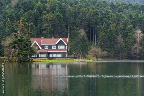 Bolu Golcuk Tabiat Parki. Bolu National Park. Landmarks or touristic places of Turkey. Wooden green house by the lake. 