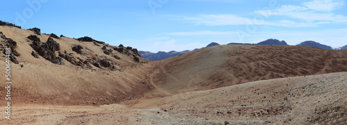 Panoramic view of the hiking trail through the barren landscape in El Teide National Park