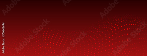 Abstract halftone background with curved surface made of small dots in red colors