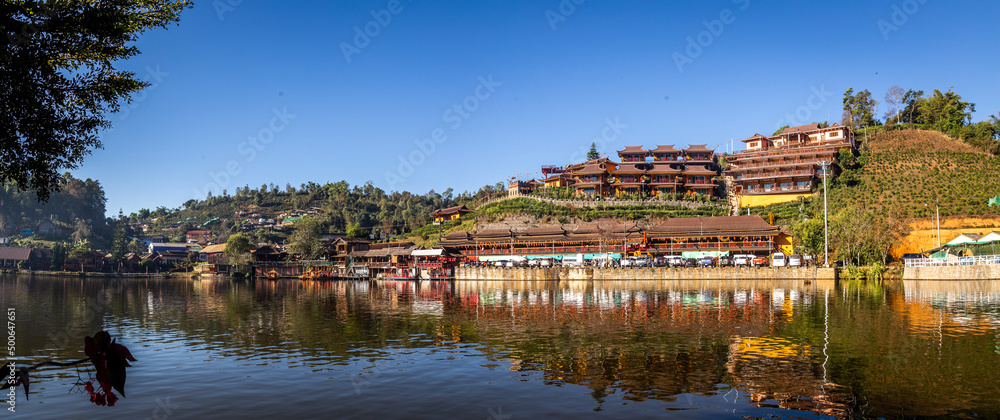 Fototapeta premium Sunrise with fog over Ban Rak thai, chinese village near a lake in Mae Hong Son, Thailand