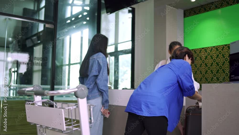 Passengers or travellers are checking in at the airport to load their luggage and pick up their tickets or boarding passes at international airport in travel and transportation concept. Passengers or travellers are checking in at the airport to load their luggage and pick up their tickets or boarding passes at international airport in travel and transportation concept.
