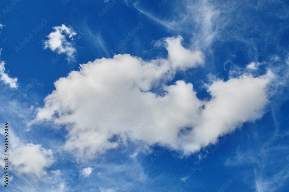 Soft white clouds in a bright blue sky Soft white clouds in a bright blue sky
