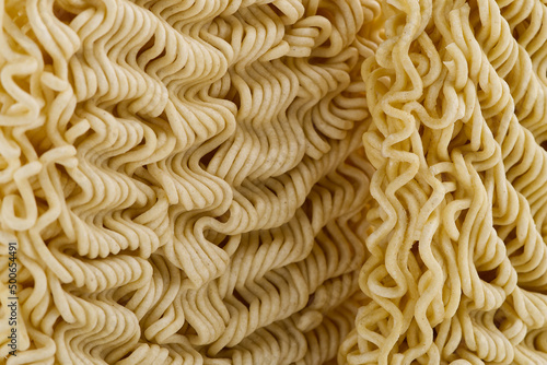 Raw Instant noodles. Close up instant noodles texture for background and packing design.