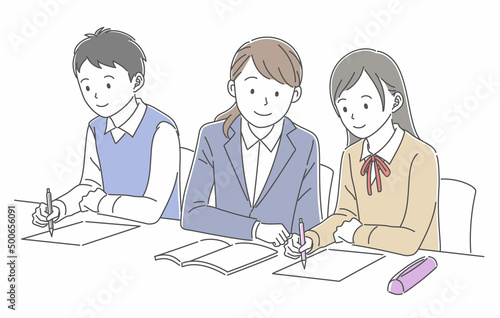 勉強をする男女の学生と勉強を教える女性教師