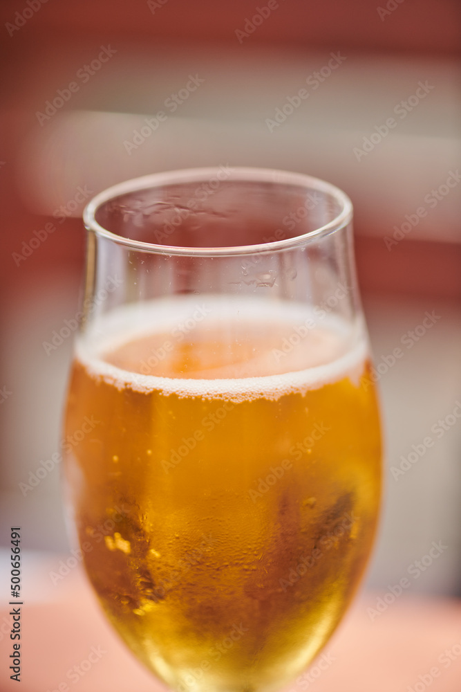 one glass of apple juice is on the table one glass of apple juice is on the table