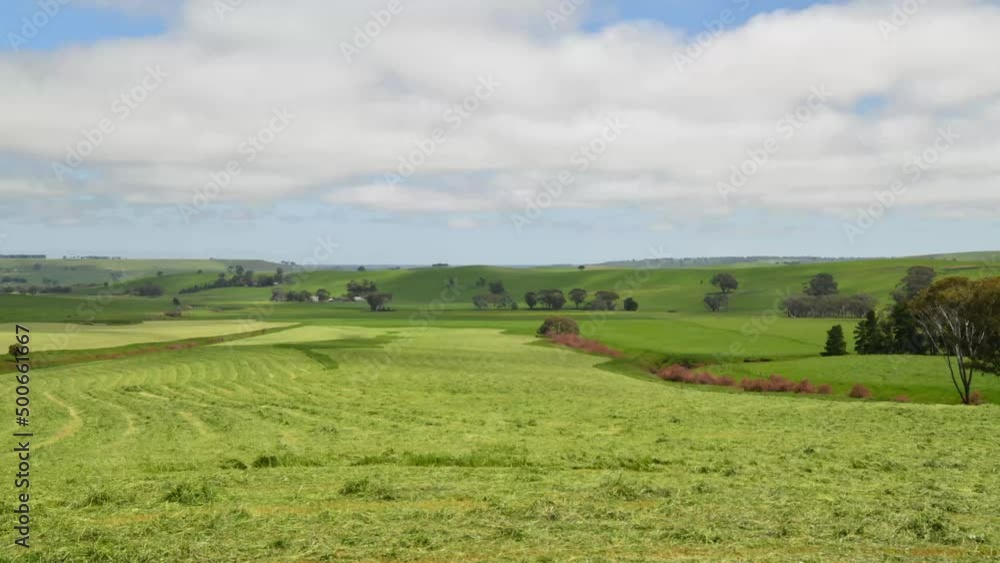 landscape timelapse of making hay and silage on a farm in victoria, australia landscape timelapse of making hay and silage on a farm in victoria, australia