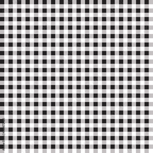Black and white tartan made of small squares. 
Intertwined with gray squares, making a monotonous and monochrome primitive pattern of squares.